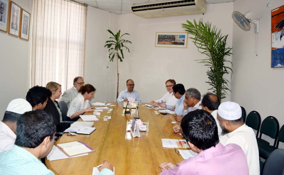 UGC Chairman Prof Abdul Mannan is seen at his office discussing with a four-member delegation from German Development Cooperation recently.