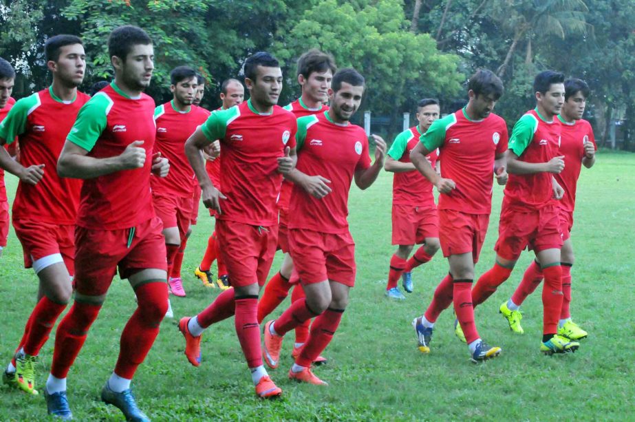 Players of Tajikistan National Football team taking part at their practice session at the BUET Ground on Sunday.
