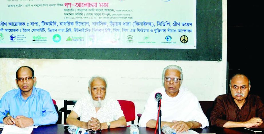 Columnist Syed Abul Maksud, among others, at a discussion organized on the occasion of World Environment Day by different organisations at Jatiya Press Club on Monday.