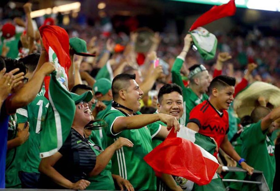 Mexico fans cheer after a goal against Uruguay during the second half of a Copa America group C soccer match at University of Phoenix Stadium in Glendale, Ariz on Sunday.
