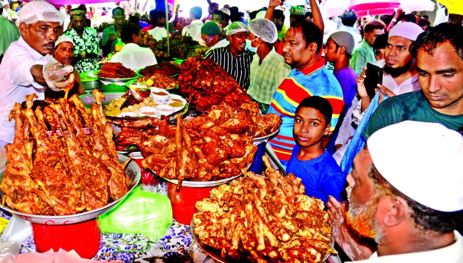 On the first day of holy Ramzan people thronged at city's Chawkbazar market to purchase high-profile Iftar items on Tuesday.