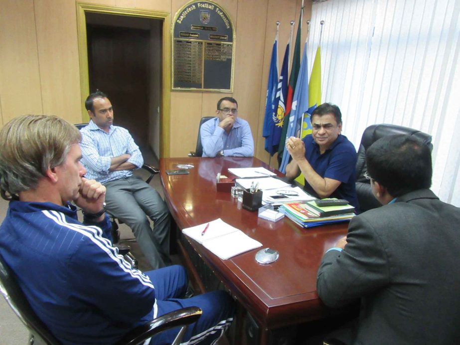 Head Coach of Bangladesh National Football team Lodewijk de Kruif talking to the President of BFF Kazi Salahuddin and the other BFF officials at the BFF House on Wednesday.