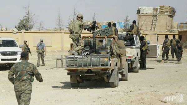 Syrian Democratic Forces seen in the village of Fatisah in the northern province of Raqa.