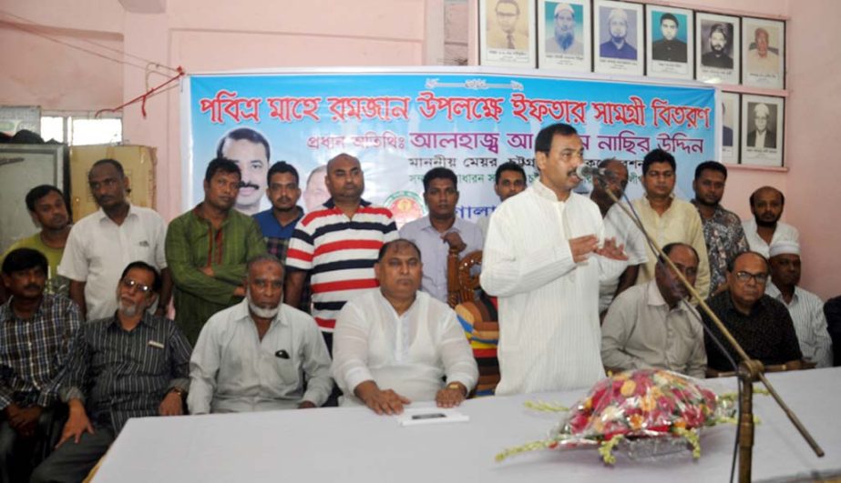 CCC Mayor A J M Nasir Uddin speaking at an Iftar items distribution programme among poor people organised by South Motherbari Ward on Thursday.