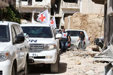 A convoy of trucks carrying food arrived in Daraya delivering rice, lentils, sugar, oil and wheat flour to civilians for the first time since the regime laid siege