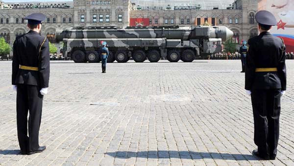 Russian Top ol-M intercontinental nuclear-capable ballistic missiles are seen being driven through Red Square during a military parade in Moscow.