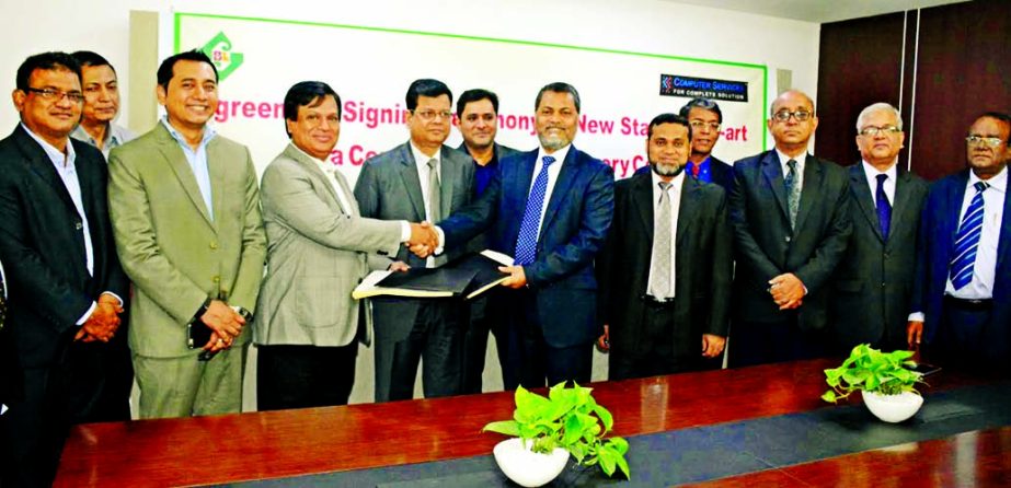 Md Nazmus Salehin, Managing Director of Standard Bank Ltd and Momluk Sabir Ahmed, Managing Director of Computer Services Limited, sign an agreement for data recovery at SBL head office recently.