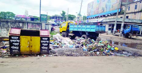 SYLHET: Environment pollution has taken a serious turn in different parts of Sylhet city as people are not using dustbins despite having garbage cans beside roads. This picture was taken from Kadamtoli area in South Surma Upazila yesterday.