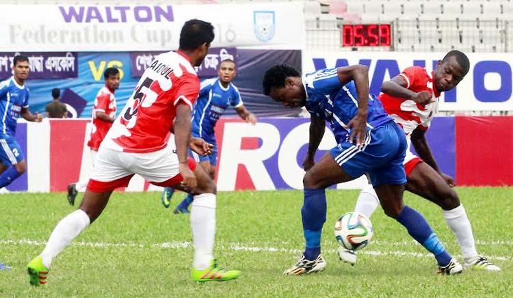 A moment of the football match of the Walton Federation Cup between Sheikh Russel Krira Chakra Limited and Bangladesh Muktijoddha Sangsad Krira Chakra at the Bangabandhu National Stadium on Wednesday.