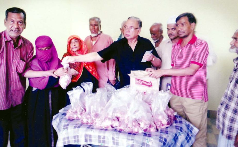 Alhaj Nurul Absar Mia, President, Pahartoli Thana Awami League distributing cash , iftar items among the poor people recently.