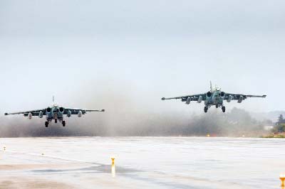 Photo shows Russian Sukhoi Su-25 ground attack aircrafts taking off from Hmeimim military base in Latakia province.