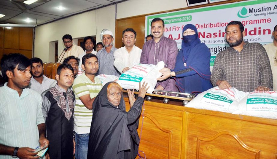 CCC Mayor AJM Nasir Uddin distributing Iftar items among the distressed people organised by Muslim Aid Bangladesh yesterday.