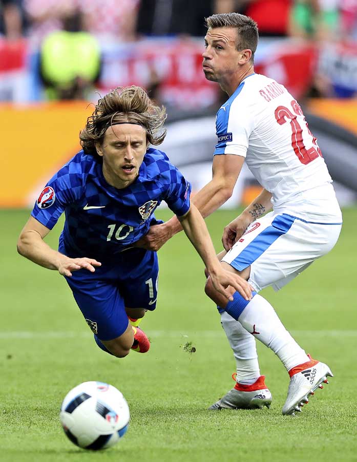 Croatia's Luka Modric (left) and Czech Republic's Ladislav Krejc vie for the ball during the Euro 2016 Group D soccer match between the Czech Republic and Croatia at the Geoffroy Guichard stadium in Saint-Etienne, France on Friday.