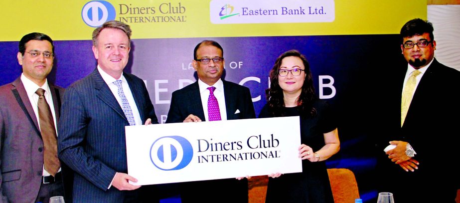 Annie Zhang, Regional Managing Director, Asia Pacific, Diners Club International and Ali Reza Iftekhar, Managing Director of Eastern Bank Limited join at the formal launching of Diners Club Credit Card at a city hotel recently. Nazeem A. Choudhury, Head o