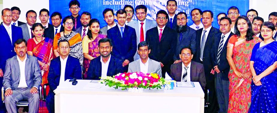 Md Arfan Ali, Additional Managing Director of Bank Asia, poses with the participants of a training program titled "Submission of Bangladesh Bank Return's and Introduction of Bulk Data Module System for Reporting to Bangladesh Bank including Online Repor