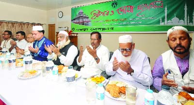 BOGRA: Abdul Manna MP with other guests offering Munajat at Iftar and Doa Mahfil organised by Bogra Press Club at T M S S Mohila Madrasa Auditorium on Saturday.