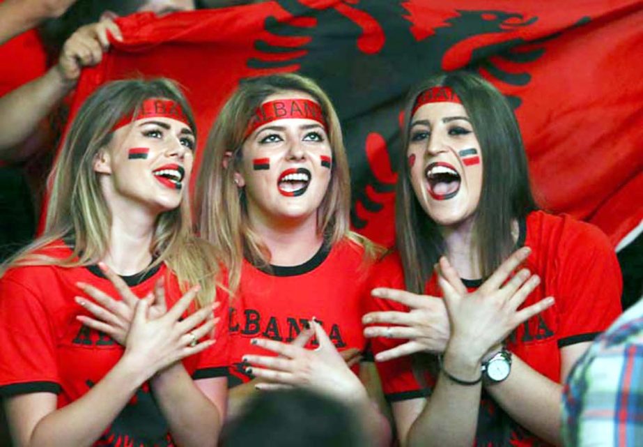 Albanian soccer fans celebrate after their country won the Group A match against Romania in Tirana, Albania on Sunday. Albania kept its hopes of qualifying for the round of 16 alive with a 1-0 victory over Romania on Sunday, a result that eliminated its o