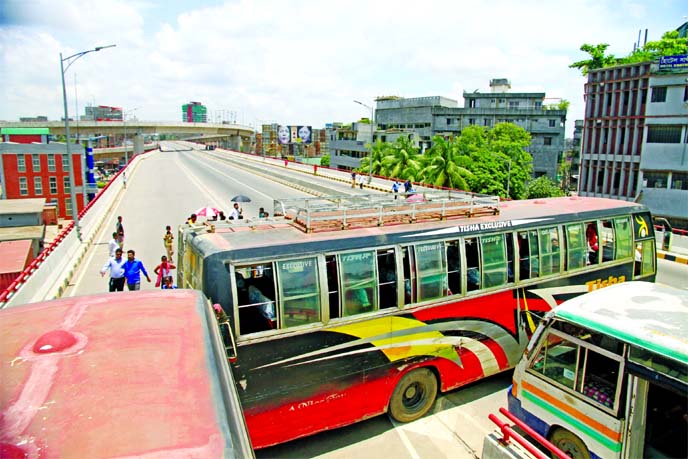 Hanif flyover was kept blocked by two groups of rival transport workers when they clashed over occupation of union office near eastern side of Bangabhaban on Monday.