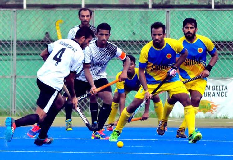 An action from the Super League match of the Green Delta Insurance Premier Division Hockey League between Dhaka Abahani Limited and Dhaka Mohammedan Sporting Club Limited at the Moulana Bhashani National Hockey Stadium on Tuesday.