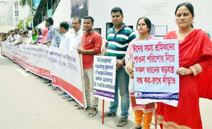 Industrial Bangladesh Council formed a human chain in front of the Jatiya Press Club on Tuesday demanding payment of all outstanding salaries before Eid-ul-Fitr for workers.