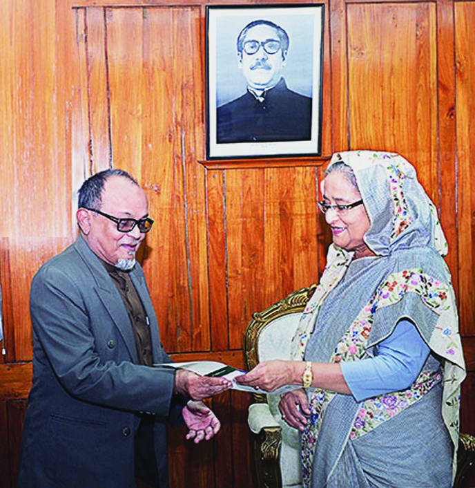 Islami Bank Bangladesh Ltd Chairman Engineer Mostafa Anwar, handing over a cheque of Tk15 crore to Prime Minister Sheikh Hasina for her Relief and Welfare Fund at her Jatiya Sangsad office on Tuesday. Managing Director of the bank Abdul Mannan and one of