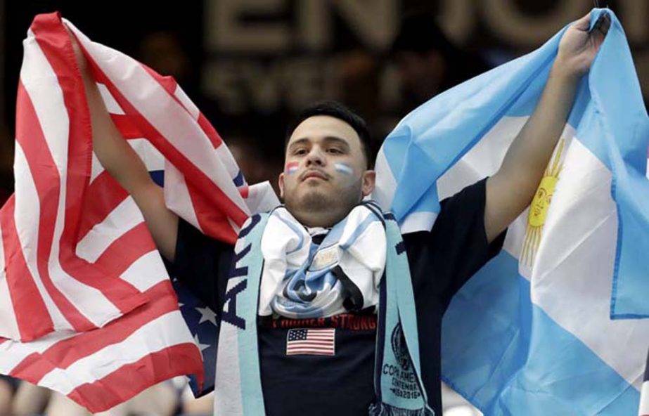 A soccer fan shows pride for both sides before a Copa America Centenario semifinal soccer match between the United States and Argentina on Tuesday in Houston.