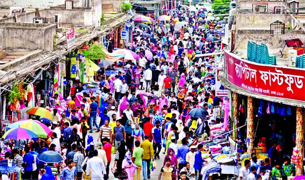 Hundreds of people throng New Market to buy their Eid items, specially saree, selwar, kamiz, punjabi, ornaments and other essentials, turning the entire area into a crowded place on Thursday.