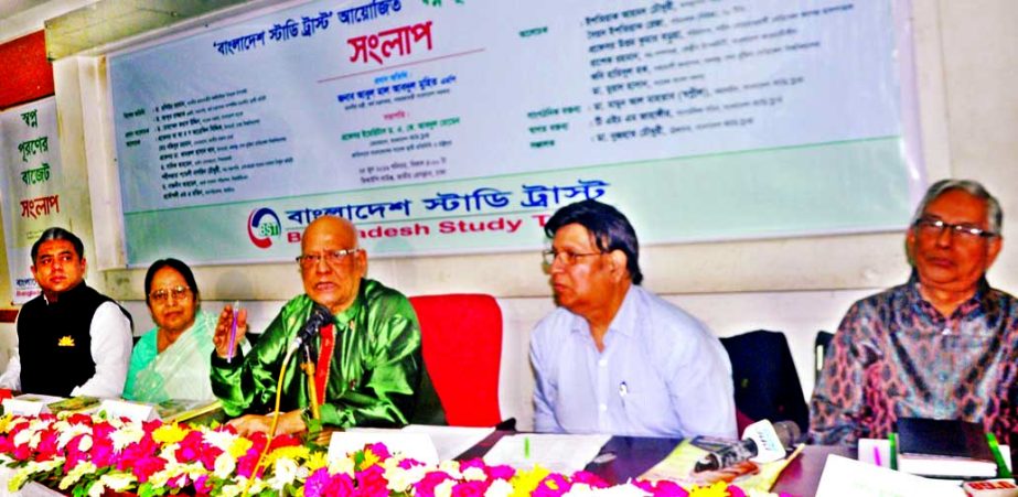 Finance Minister Abul Maal Abdul Muhith speaking at a dialogue titled 'Budget for materializing dream' organised by Bangladesh Study Trust at Jatiya Press Club on Saturday.