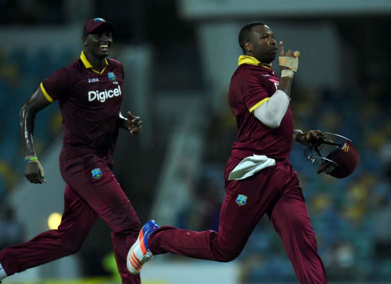 Kieron Pollard celebrates the dismissal of Chris Morris during the Tri-Nation ODI match between West Indies and South Africa at Bridgetown on Friday.