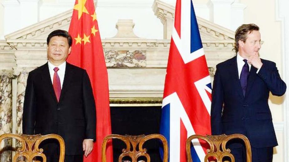 China's President Xi Jinping with British Prime Minister David Cameron in London.