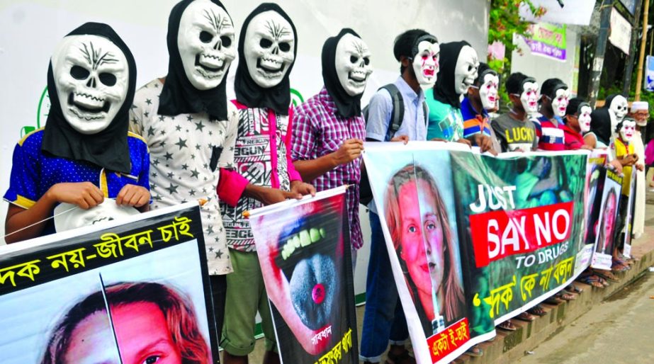 Prottasha, an anti-drug organization formed a human chain in front of the National Press Club marking the International Day against Drug Abuse and Illegal Trafficking and Prevention Day yesterday.