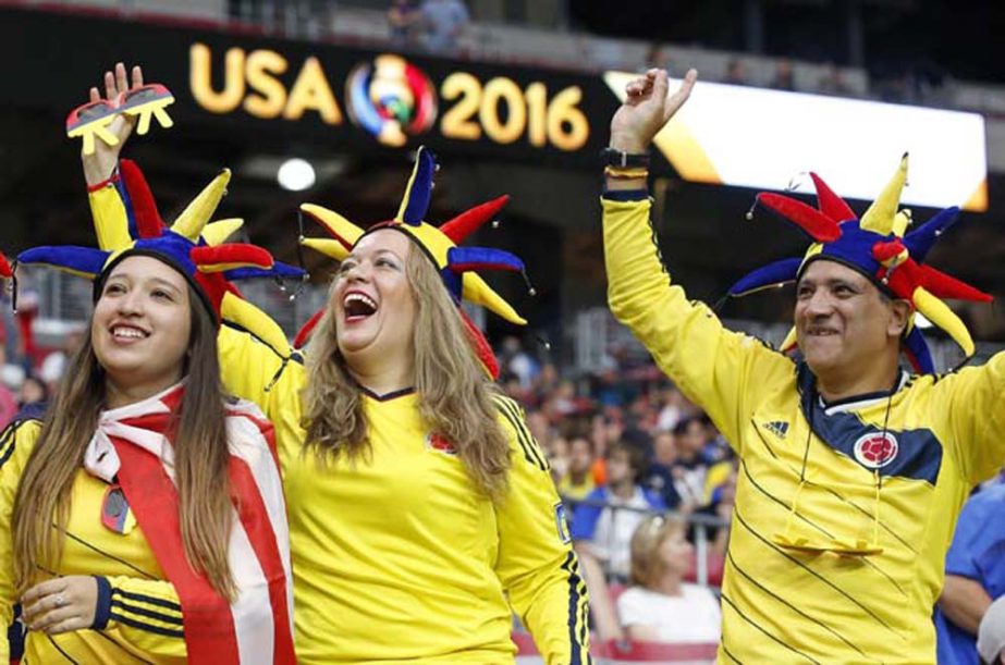 Colombia soccer fans cheer on their team as they come out onto the pitch to warm up prior to the Copa America Centenario third-place soccer match against the United States in Glendale, Ariz on Saturday.