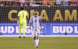 Jun 26, 2016; East Rutherford, NJ, USA; Argentina midfielder Lionel Messi (10) reacts after missing a shot during the shoot out round against Chile in the championship match of the 2016 Copa America Centenario soccer tournament at MetLife Stadium. Chile w