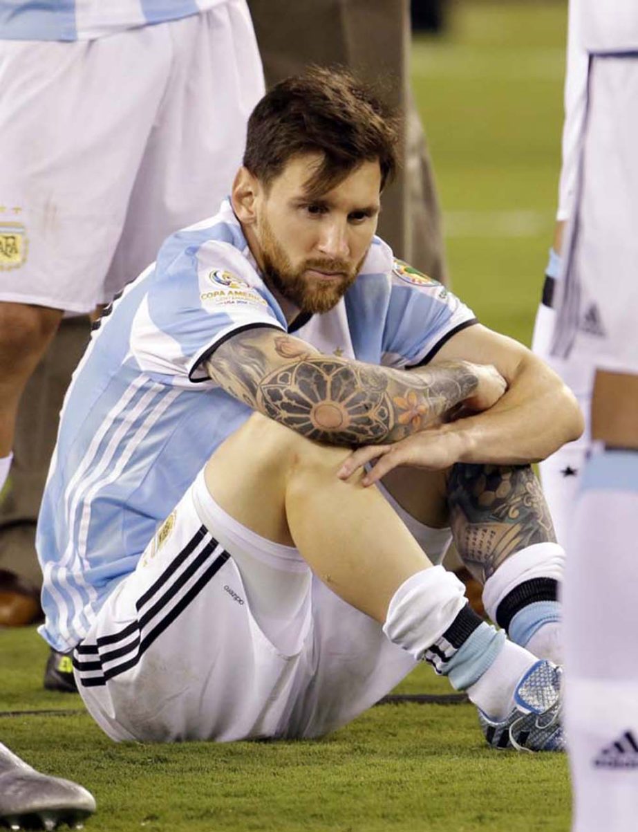 Argentina's Lionel Messi waits for trophy presentations after the Copa America Centenario championship soccer match in East Rutherford, N.J. on Sunday.