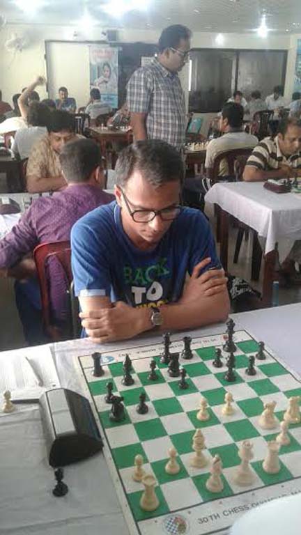 GM Mollah Abdullah Al Rakib of Bangladesh Navy in action during the 5th round games of the Saif Powertec International Rating Chess Tournament at the National Sports Council Tower Auditorium Lounge on Tuesday.