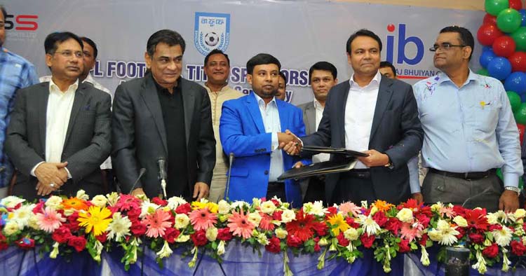 Chairman of Saif Global Sports Limited Tarafder Md Ruhul Amin (second from the right) and Chairman of Jaj Bhuiyan Group Faizur Rahman Bhuiyan Jewel exchanging papers after signing an agreement at the conference room of Bangladesh Football Federation House