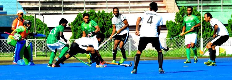 An action from the Super League match of the Green Delta Insurance Premier Division Hockey League between Dhaka Mohammedan Sporting Club Limited and Usha Krira Chakra at the Moulana Bhashani National Hockey Stadium on Wednesday.