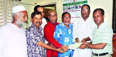 RANGPUR: Rangpur Chamber President Abul Kashem handing over a pay order to Government Zakat Fund through ADC( Gen) Dr ATM Mahabubul Karim at his office on Thursday.