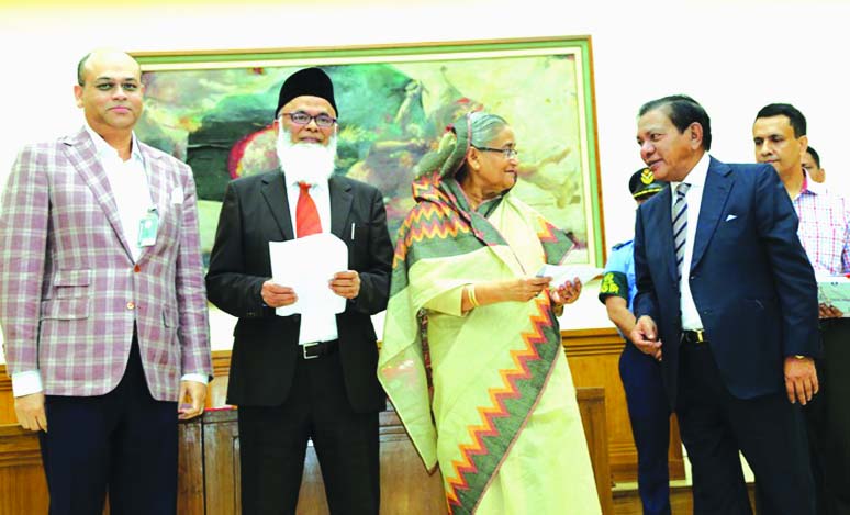 M. A. Sabur; Chairman of United Commercial Bank Limited recently handed over a donation cheque of Tk 15 million to Prime Minister Sheikh Hasina for 'Prime Minister's Relief Fund' at Gonobhobon. Anisuzzaman Chowdhury; Vice
