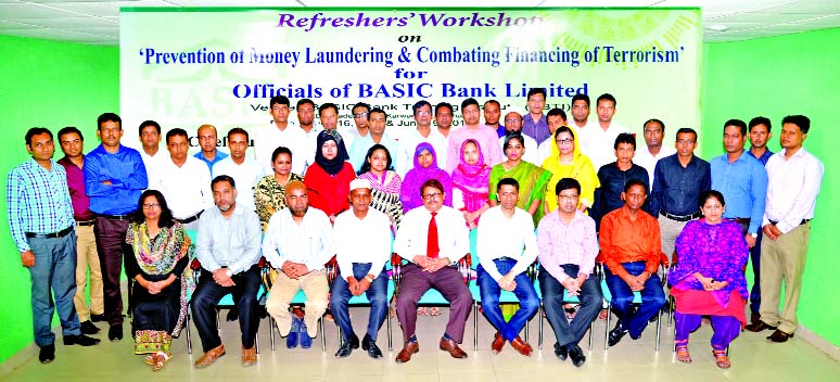 Kanak Kumar Purkayastha, Deputy Managing Director of BASIC Bank Limited, poses with the participants of a day-long workshop on 'Prevention of Money Laundering & Combating Financing of Terrorism' for officials at its Training Institute recently.