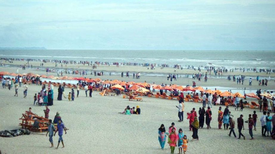 Huge tourists thronged the Cox's Bazar Sea Beach ahead of Eid. This picture was taken on Friday.