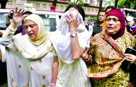 Relatives wailing after hearing the news of the victims of hostages killed by gunmen in city's Gulshan restaurant on Saturday night.