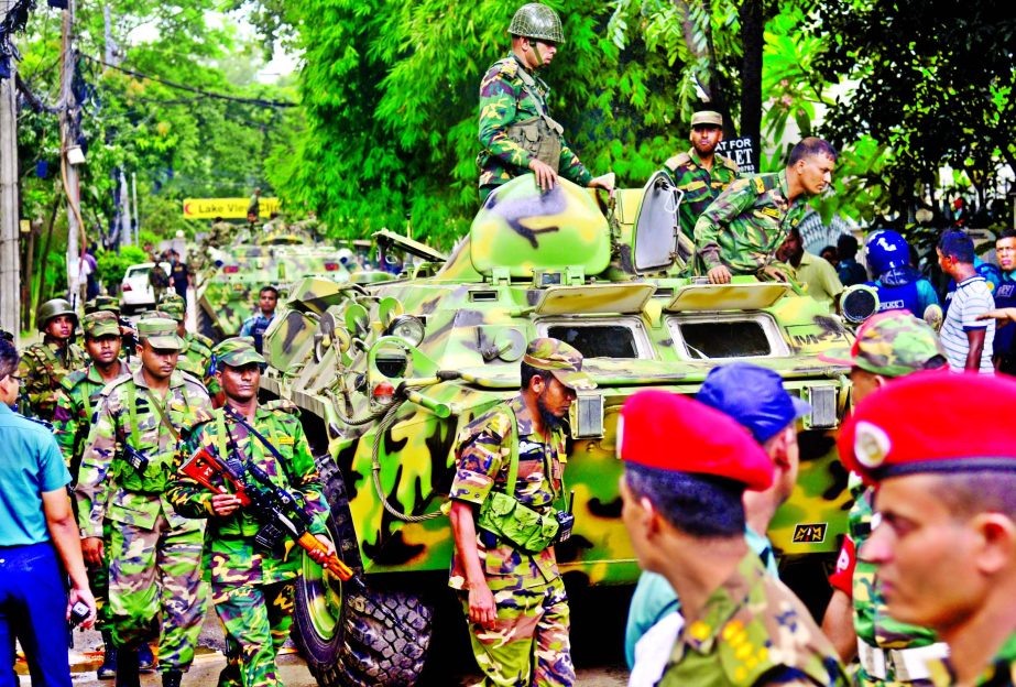 Members of para-commando unit of Bangladesh Army are taking preparation before operation 'Thunderbolt' launched at Spanish restaurant in city's Gulshan to rescue foreign and local hostages on Saturday morning. Armoured personnel carriers also seen on t