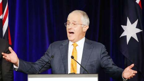 Australian Prime Minister Malcolm Turnbull addresses party supporters during a rally in Sydney on Sunday following a general election.