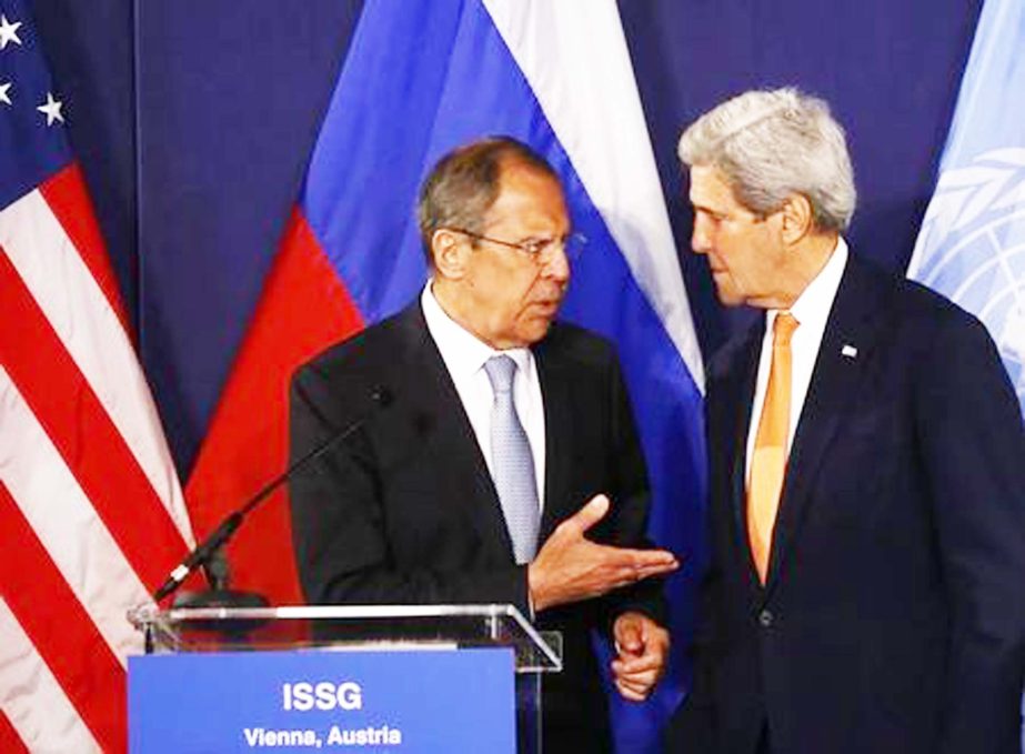 Russian Foreign Minister Sergei Lavrov (L) speaks to US Secretary of State John Kerry before their news conference in Vienna, Austria.