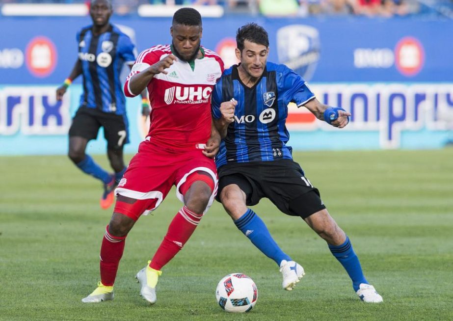 New England Revolution's Andrew Farrell (left) challenges Montreal Impact's Ignacio Piatti during the second half of an MLS soccer game in Montreal on Saturday.