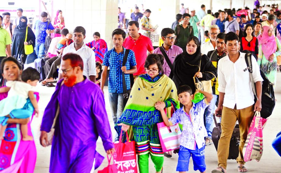 The people who left the city for homes to celebrate Eid-ul-Fitr with their near and dear ones are seen returning in the city . This photo was taken from Kamalapur Railway Station on Saturday.