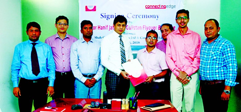 Kazi Asif Iqbal, AGM-Accounts & Finance, Shah Cement Ind. Ltd and Azad Hossain, Director, Connecting Edge respectively signed an agreement on "Mayor Mohammad Hanif Flyover Branding" recently. Md. Ibrahim Khalil, Brand Manager, Shah Cement, Sharif Sabbir