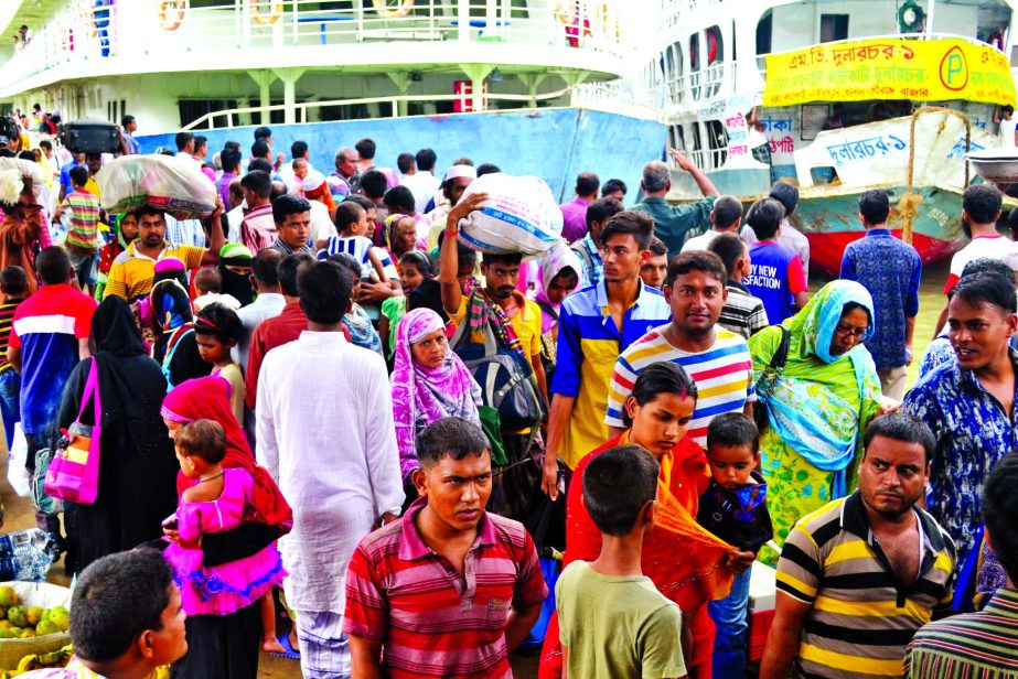 People returning to the capital after Eid celebration with their near and dear ones. This photo was taken from Sadarghat Terminal on Sunday.