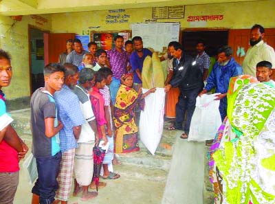 NILPHAMARI: Rice under special VGF programme being distributed among distressed people at Songolshi Union of Sdar Upazila in the district from July 5-7.